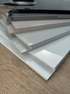 High-Gloss Handleless Kitchen Door in Dust Grey Levana Modern Grey Finish | Aspin Collins